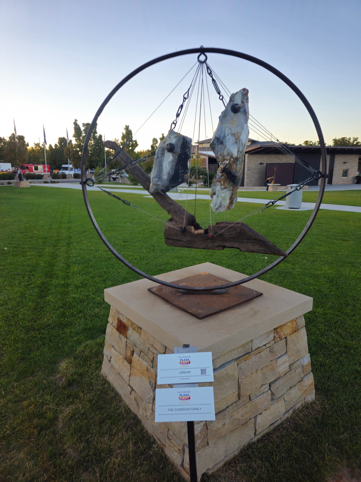 Dream, a marble steel and wood sail sculpture by Byron Ramos at Taylorsville Centennial Plaza